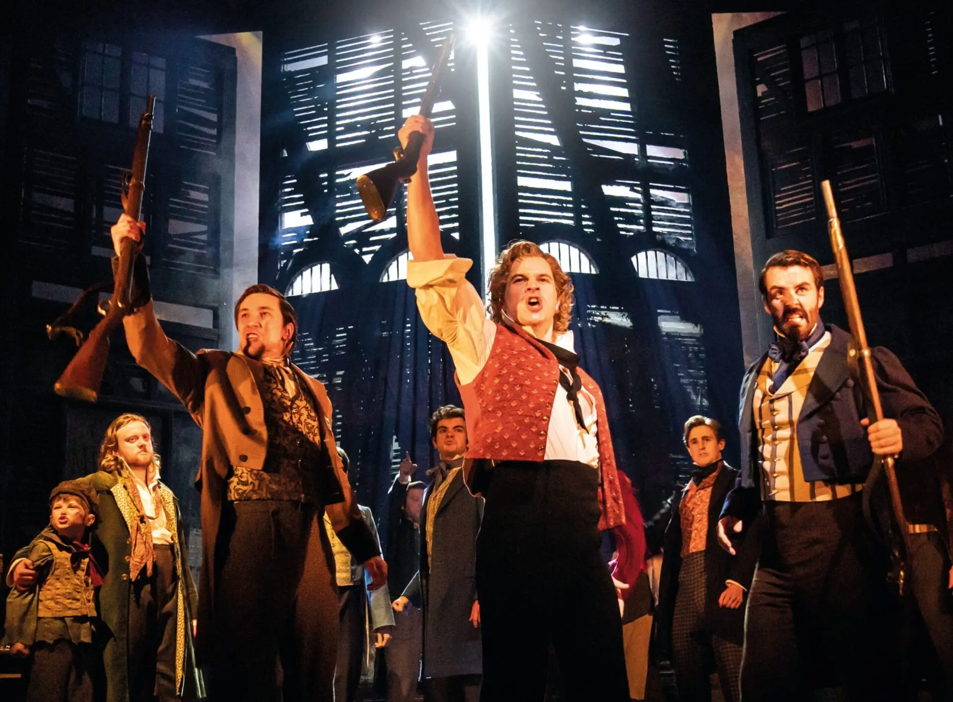 Ashley Gilmour as Enjolras and Company - Photo: Johan Persson