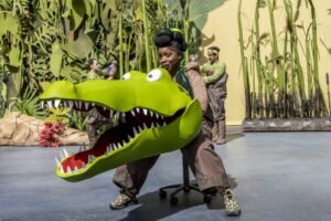 Malinda Parris as the Crocodile. (Photo: Johan Persson)