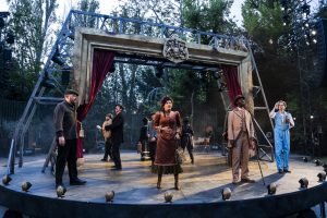 Will Brown as an extra,  Patrick Warner as an extra, Nadi Kemp-Sayfi as Mary Morstan, Jyuddah Jaymes as  Dr Watson, and Joshua James. as Sherlock Holmes  (Photo: Tristram Kenton)